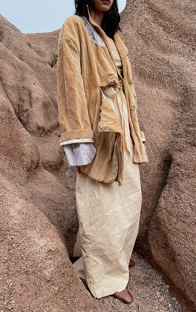 Raw edge is a critical feature to the whole look, but all the unfinished details are applied artistically.