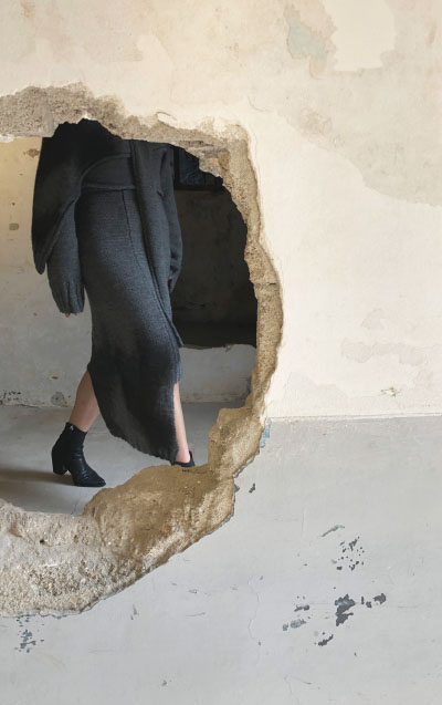 Asymmetrical high-waisted long skirt, with ebony black hand-dyeing, depicting ash.