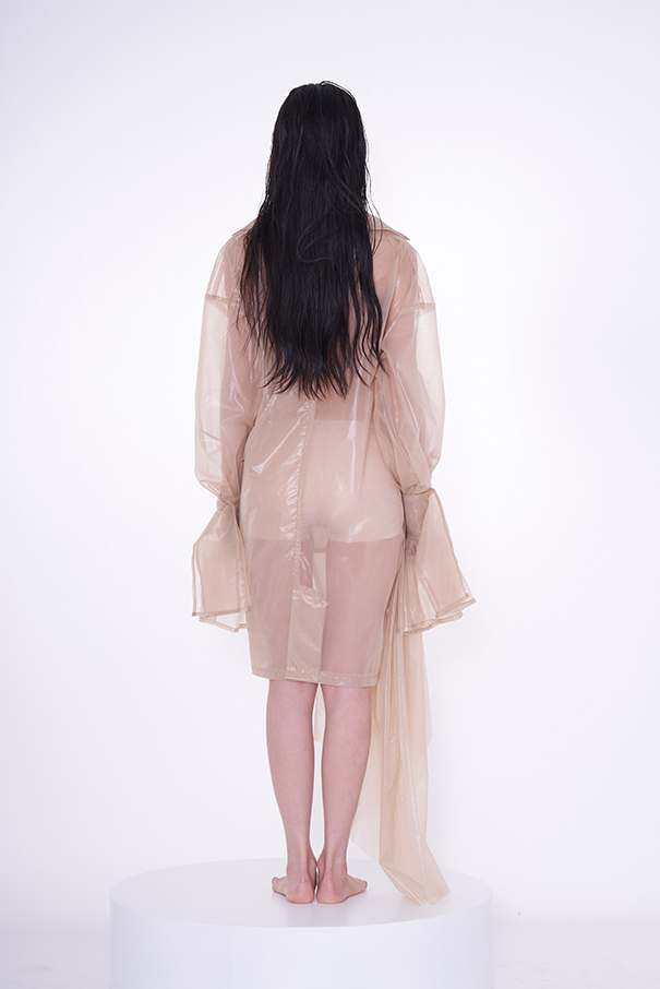 Back view of organza jacket with long sleeve.