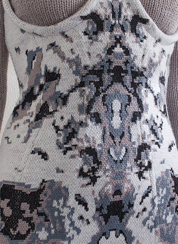 "This pattern was inspired by ink-blot tests, which were used to diagnose mental illness in the mid 20th century. The double jacquard was created using Stoll M1 software.