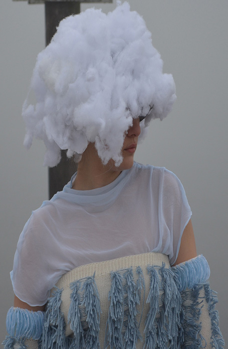 "The cloud-like hat floats above the wearer's body introducing a serene aura to the look. "