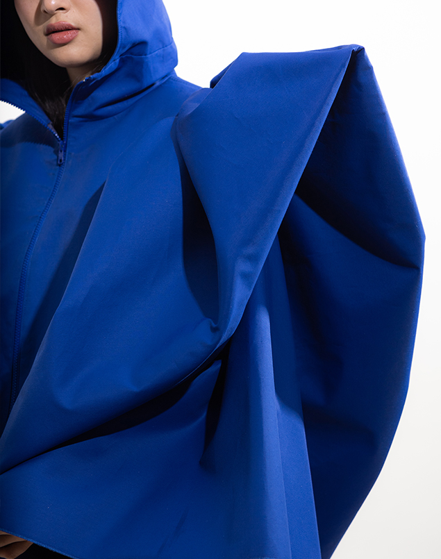 The inside of the draped ”wing" and sleeves