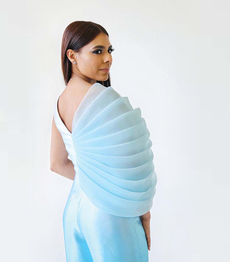 Asymmetrical ombré blue jumpsuit with light blue organza on the side blue pleats
