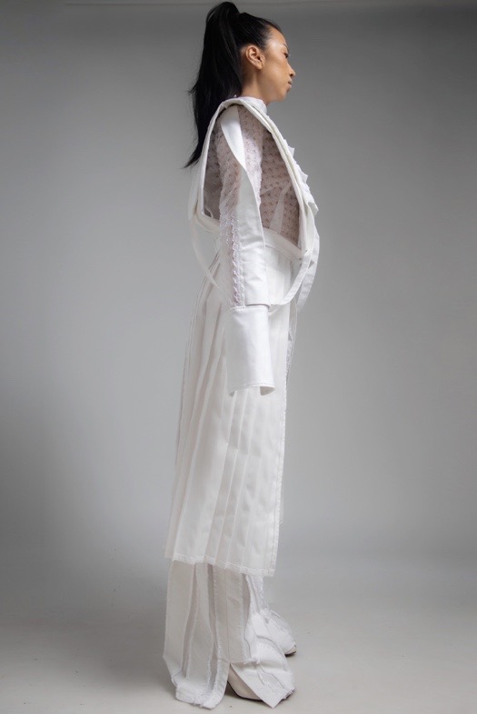 The fabrication is all white, and it mixes different textures together.