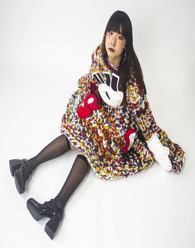 Model posing in garment