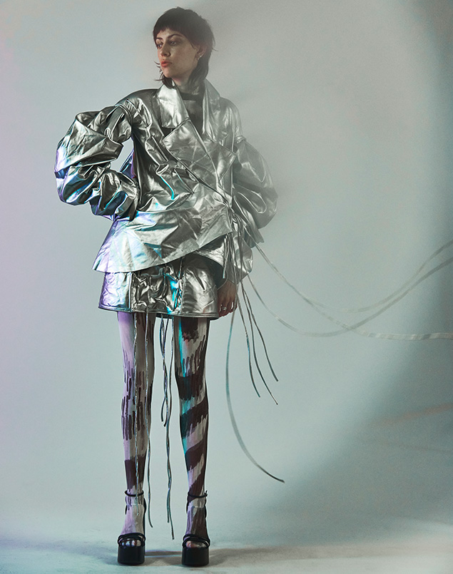Full view of the look with animated punch card strings