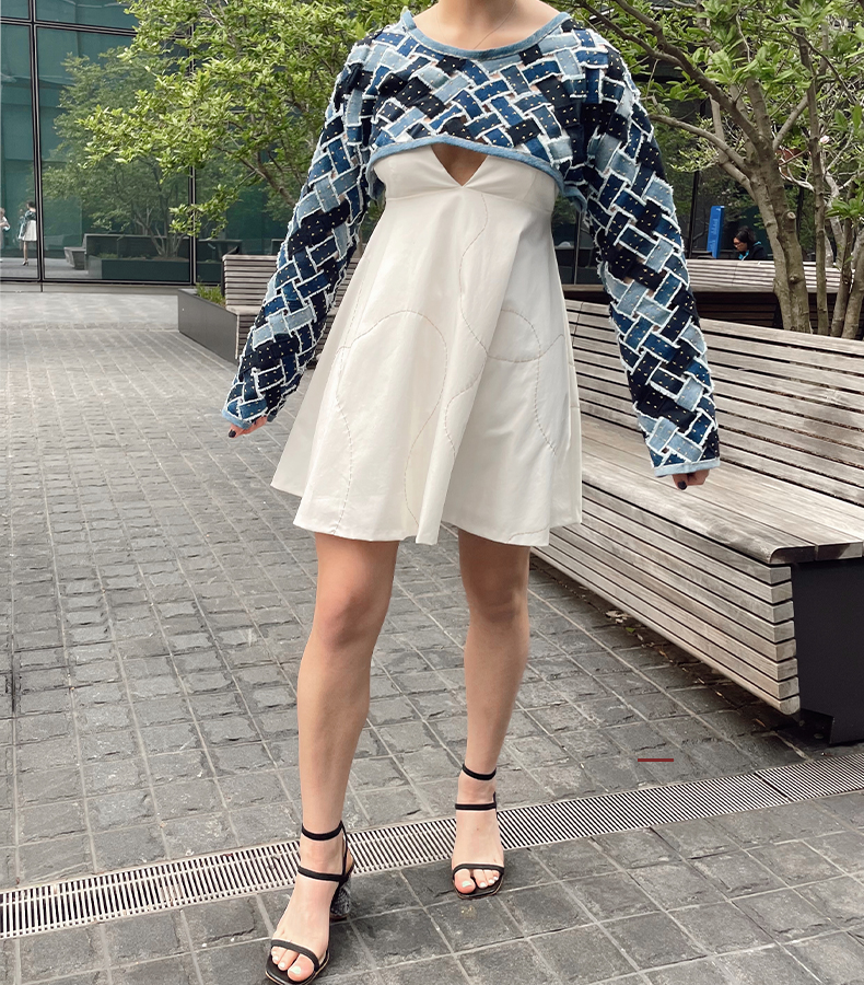 Recycled denim mesh sleeve with gold embroidered stitching