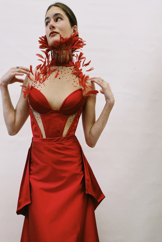 Full image from hip to head of the front of the dress, with tight top and flowy skirt