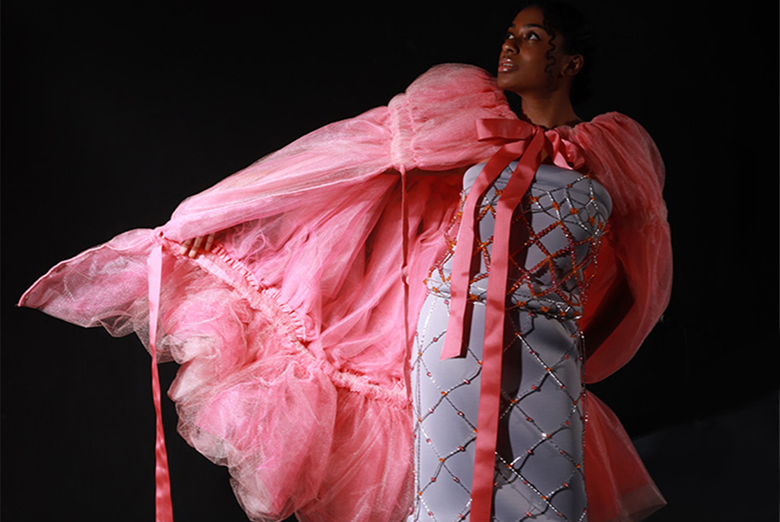 Gradiant multilayer tulle cape worn over beaded lattice and neoprene zip-away dress